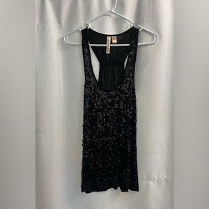 Eye shadow. Size large. Black sequins tank.